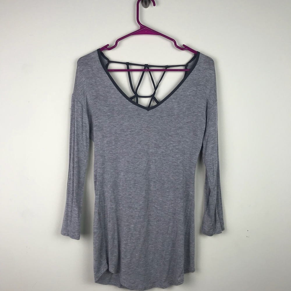 Grey long sleeve shirt with cut out back